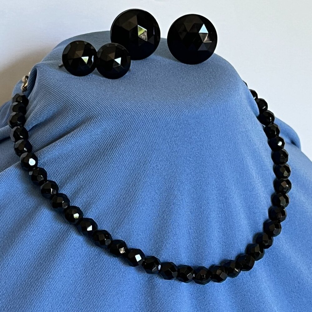 Vintage glass black bead necklace and 2 pairs clip on earrings. Beautiful